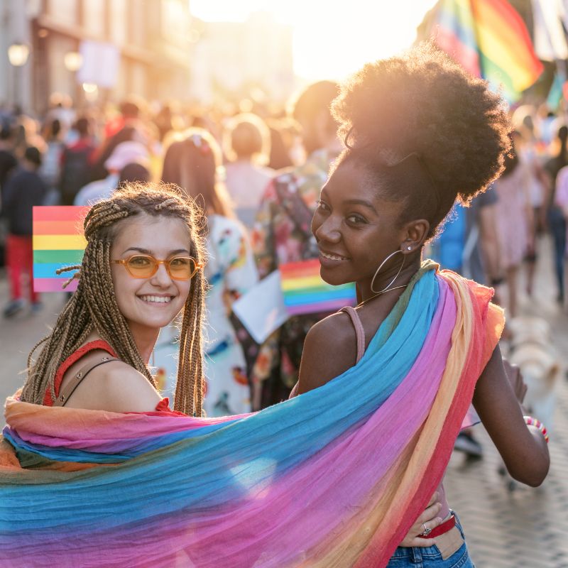 Celebrating PRIDE - happy smiles - Toot Sweet Marketing